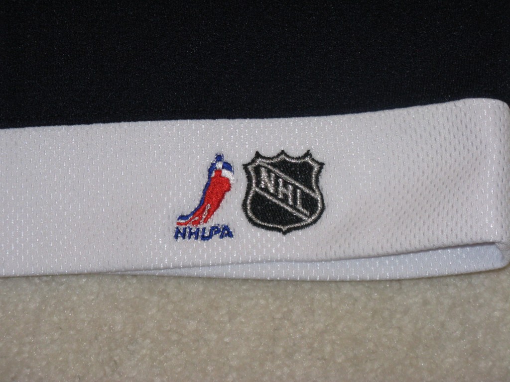 Joe Sakic 2001 All Star GI back hem tagging