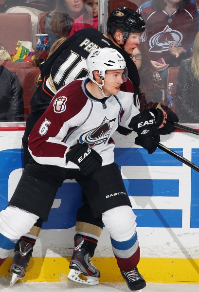 ANAHEIM, CA - APRIL 10:  Erik Johnson #6 of the Colorado Avalanche pins Corey Perry #10 of the Anaheim Ducks against the glass in the second period April 10, 2013 at Honda Center in Anaheim, California. (Photo by Debora Robinson/NHLI via Getty Images)